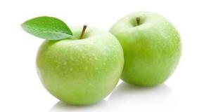Wat is de interpretatie van het zien van groene appels in een droom?