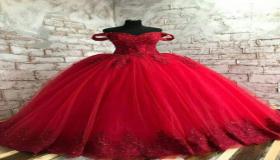 Vad är tolkningen av en dröm om en röd klänning enligt Ibn Sirin?